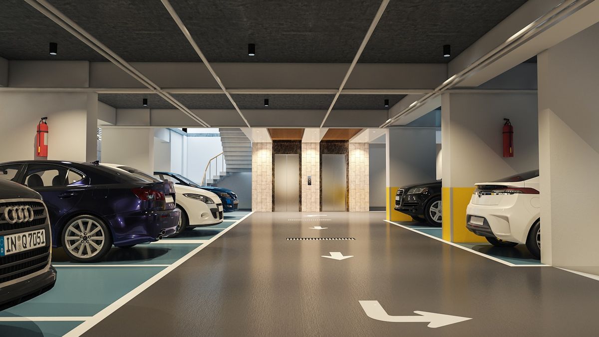 Moderne parkeringshus med parkerte biler